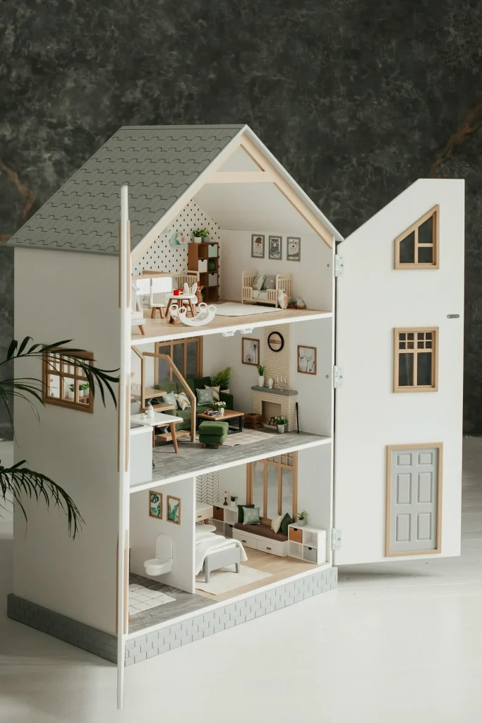 white wooden dollhouse